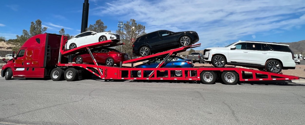 transporting vehicle in enclosed truck